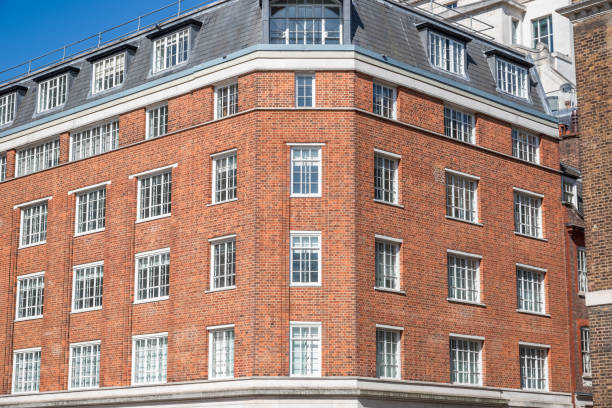 istock Facade of a red brick building with a corner view in London 2156193845