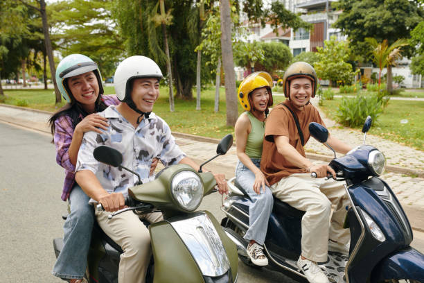 istock Friends Riding Scooters Together Outdoors 2156194940