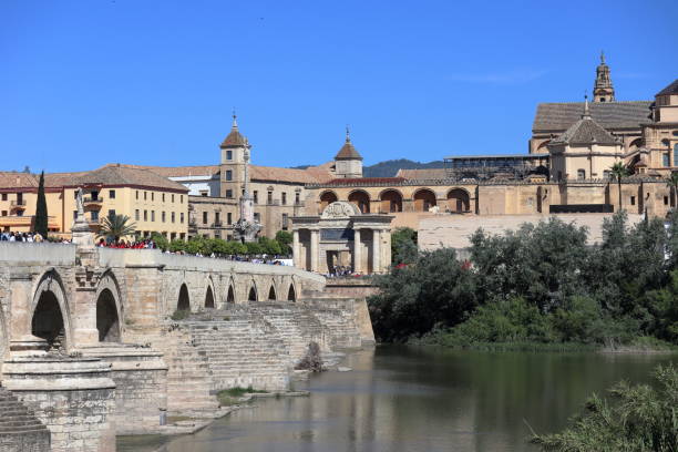 istock Panoramic view at the Mosque-Cathedral with Roman bridge in Cordoba - Spain 2156198214