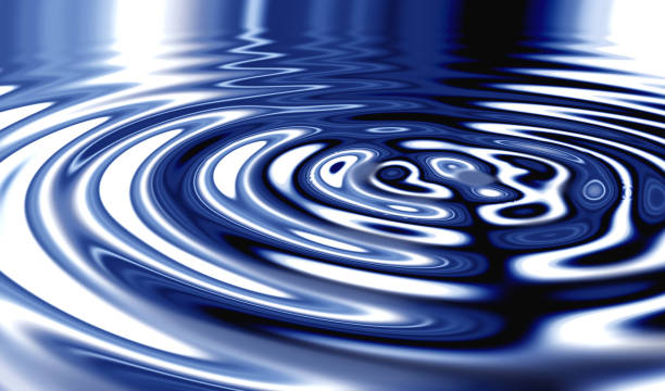 istock Closeup Smoothly Animated 3d Cgi silver shiny waves making ripples in liquid blue color substance. Shiny graphic of a glowing silver color water or fluid with a shining reflection on the surface 2156199416