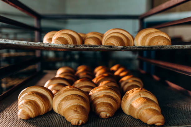 istock croissant making factory bakery fresh cook biscuit 2156200615