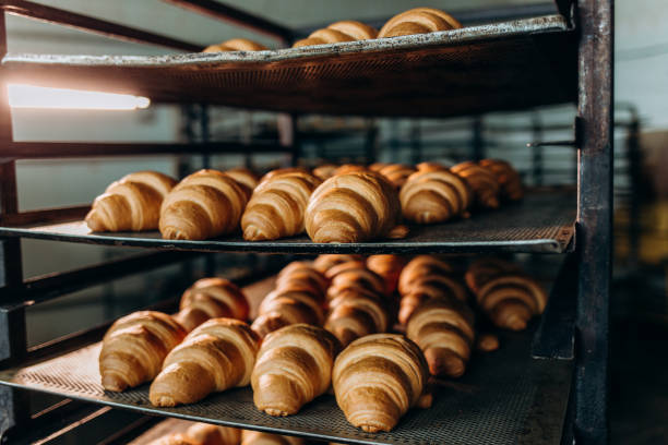 istock freshly baked croissants in the baking oven 2156200622