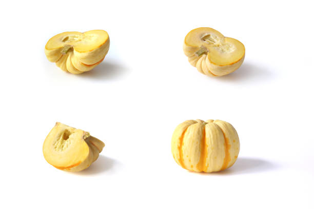 Young white yellow mini pumpkin isolated on white background. Yellow tiny baby Japan pumpkin organic vegetable on white. Pumpkin squash with slices cut