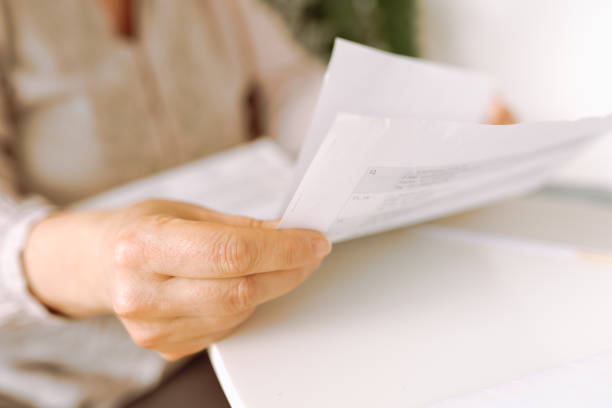 istock woman's hands holding an envelope with a letter 2156202137