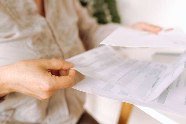 istock woman's hands holding an envelope with a letter 2156202227