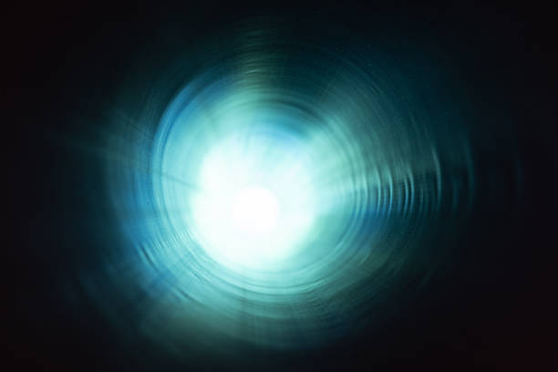 Dark tunnel perspective with glowing end. Industrial photo taken inside of a plastic tube of an underground sewerage system