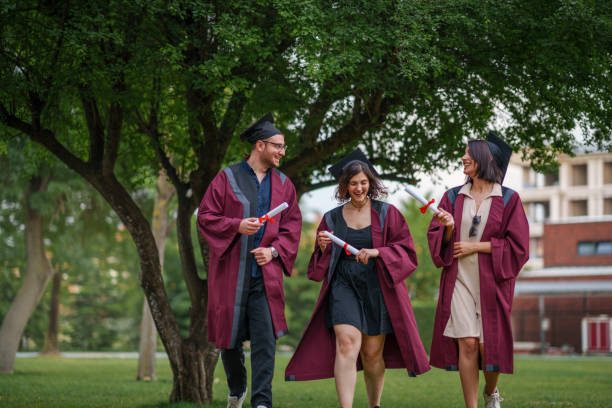 istock Group of college students  graduation day. 2156213235