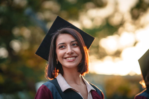 istock Portraits of college students  lined up on graduation pride. 2156214893