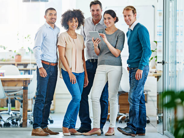 istock Tablet, people and portrait in collaboration for project on tech in office or company as team. Group, diversity and coworking for business in digital agency for deadline or development as colleagues 2156216518