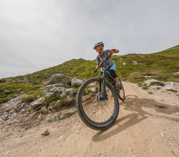 istock Mountain Biker on Rocky Trail Uphill 2156216973