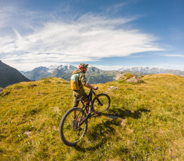 istock Mountain Biker Admiring Alpine Landscape 2156217072