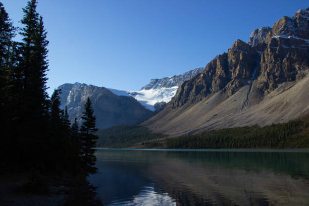 istock Crowfoot Mountain in autumn with snow. 2156218278