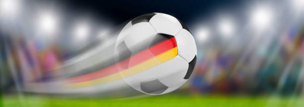 istock Soccer ball with German flag in the stadium 2156219298