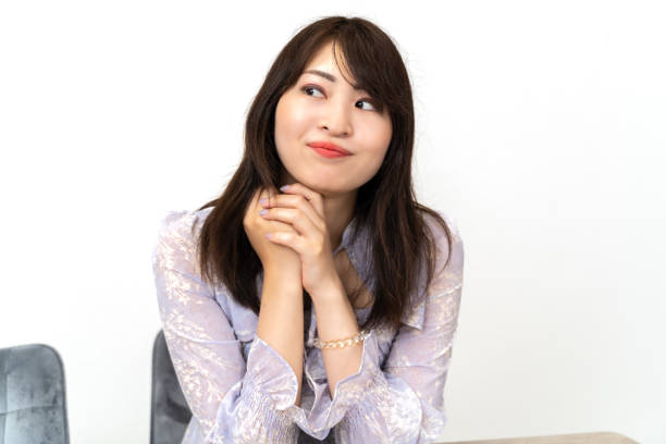 istock Woman relaxing at home 2156219447