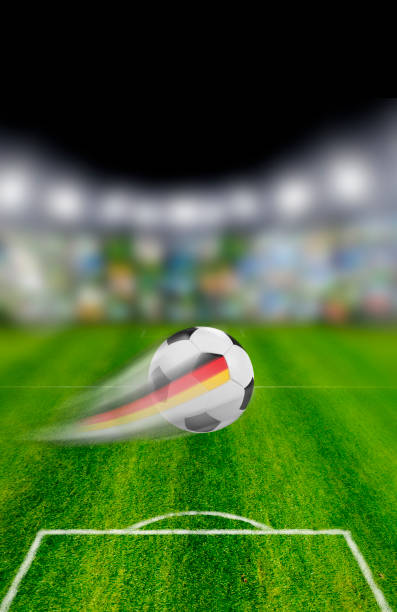 istock Soccer ball with German flag in the stadium 2156219455