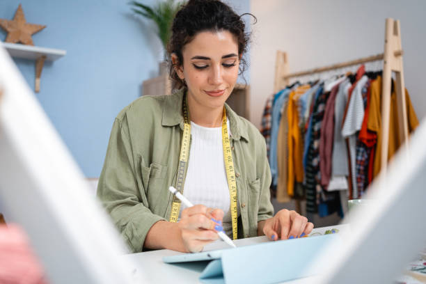 istock The creative process of making a tailor's embroidery in a dyer's studio 2156220676