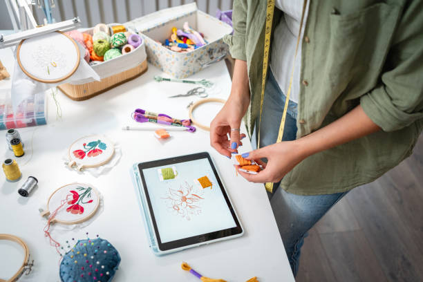 istock The dressmaker focuses on her creative process 2156220911