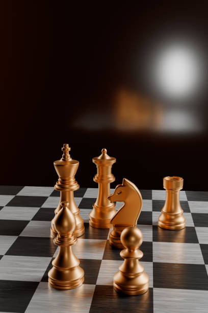 istock Gold chess pieces on a black and white chessboard with a blurred background. 3d rendering 2156222296
