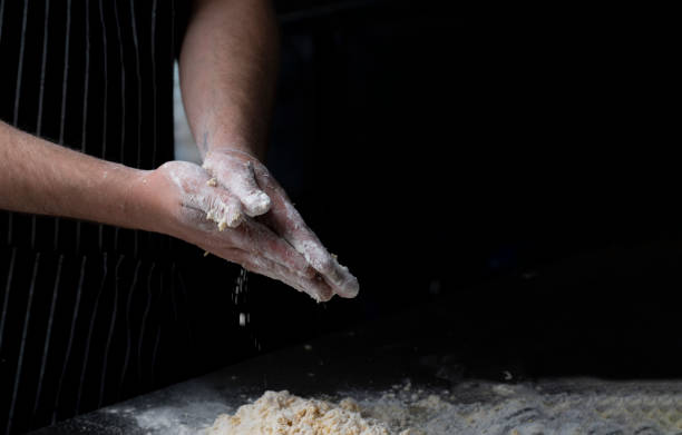 istock Chef, baker hands in flour on black banner background. Cooking pizza, pasta, bread and sweets. Design, menu, recipe book 2156222701