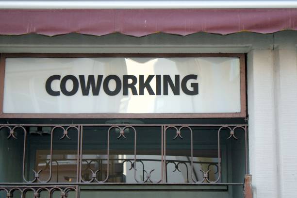 istock Coworking sign: refers to a form of collaborative office work. Freelancers, small start-ups or students work in open spaces and can benefit from each other in this way. 2156226026
