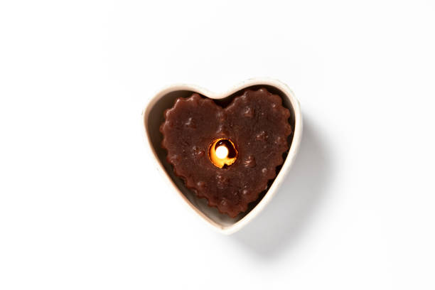Heart shaped candles burning. Valentines day concept