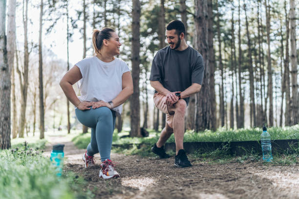 istock Couple jogging at the park 2156231476