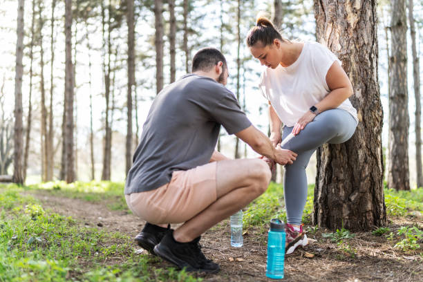 istock Couple jogging at the park 2156231564