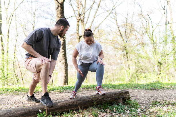 istock Couple jogging at the park 2156231638