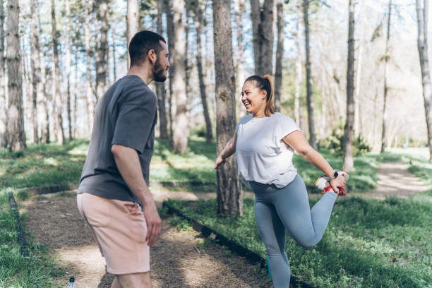 istock Couple jogging at the park 2156231690