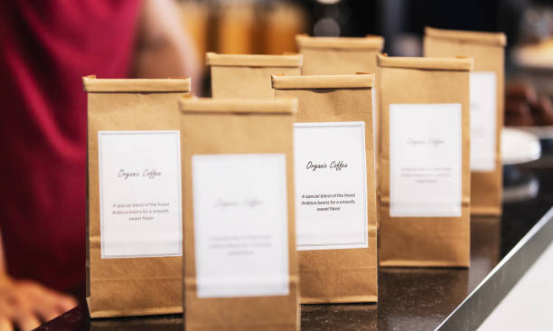 Shelves lined with sleek black coffee bags, showcasing a selection of premium coffee.