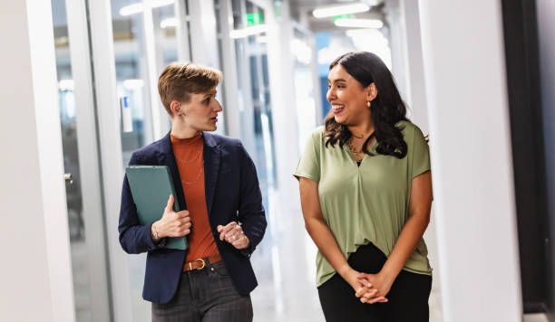 istock Manager showing new employee around office 2156234411