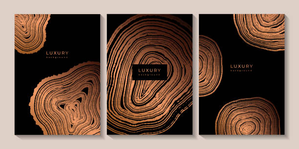 istock Set of templates. Luxury golden background with wood annual rings texture 2156235588