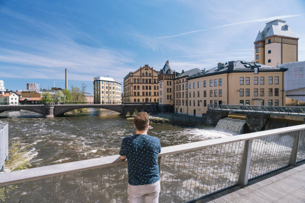 Norrköping, Sweden - July 30, 2024: The former industrial district on the Motala river is home to the Campus Norrköping, part of Linköping University, and the Nordic International School Norrköping.