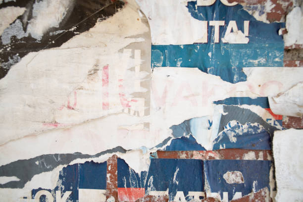 istock Torn and weathered street poster background, abstract paper collage backdrop 2156239383