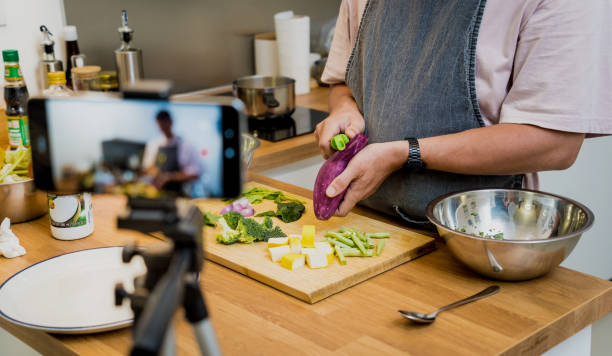 istock The chef is broadcasting live from workshop how to prepare a vegetarian green curry 2156241712