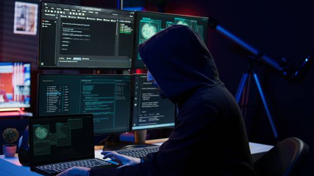 istock Hacker arriving in hidden underground shelter, prepared to launch DDoS attack 2156242382