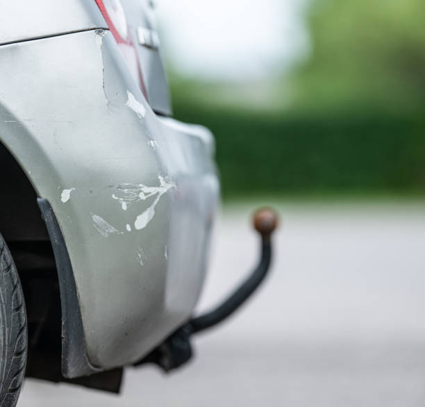 istock Damaged rear bumper of a silver compact car with tow bar.. 2156243370