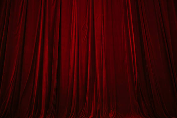 istock Red curtain in theatre background 2156244312