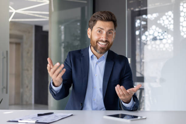 istock Confident businessman discussing ideas at modern office 2156255187