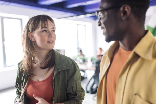 istock Young business colleagues talking 2156255416
