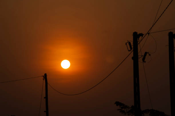 istock sunset with electricity poles and wires in the background 2156256849