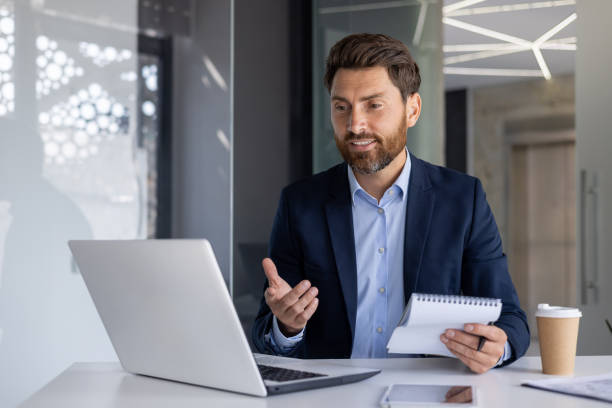 istock Professional businessman discussing during a video call 2156257273