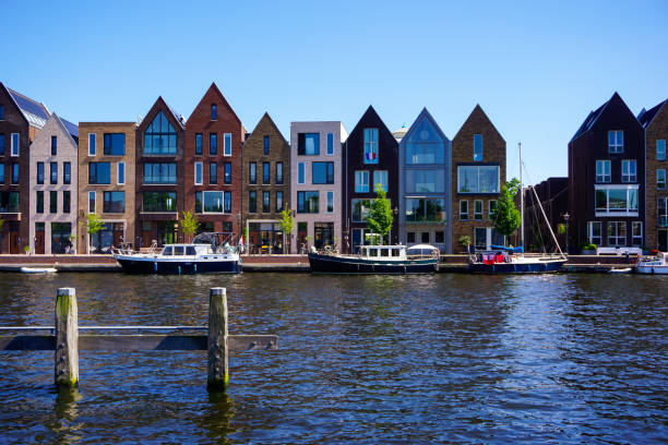 istock View of buildings by a canal during summer 2156258192