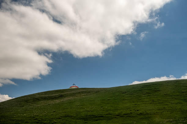 istock Grasslands and mountains on the plateau under clear weather 2156274638