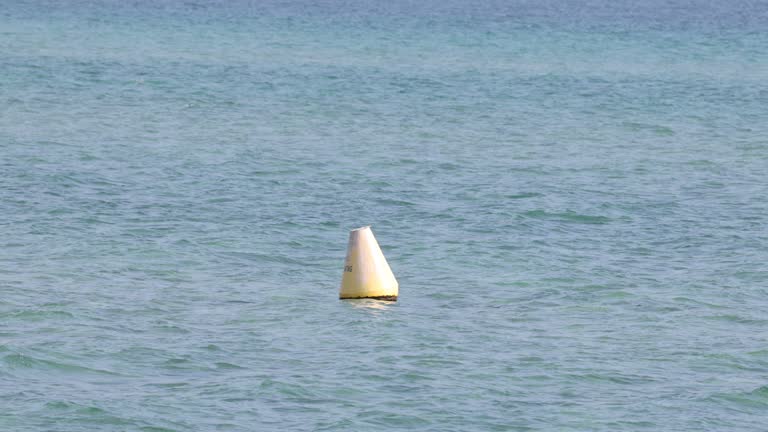 Buoy Floating in Ocean Waves