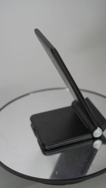 istock wireless charger device has a black charger 2156283790
