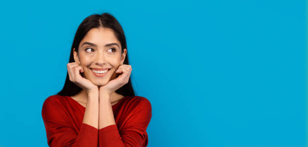 istock Woman in Red Shirt Posing for Picture 2156285498