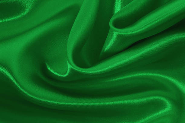 istock Green emerald fabric texture background, detail of silk or linen pattern. 2156290137