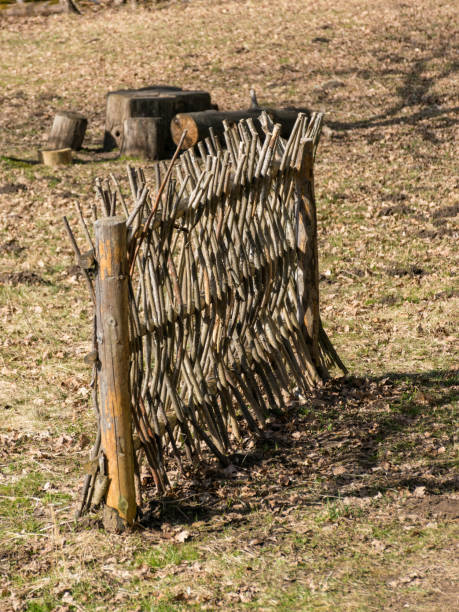 istock rural landscape with a wicker wooden fence 2156291875