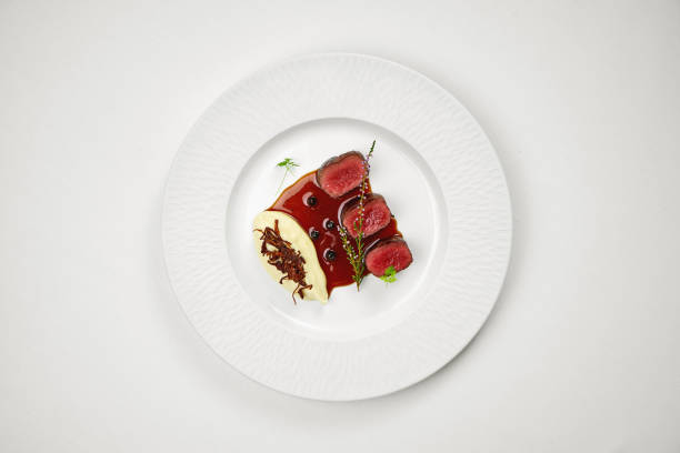 istock Medium-rare venison steak with mashed potatoes on a plate 2156295858